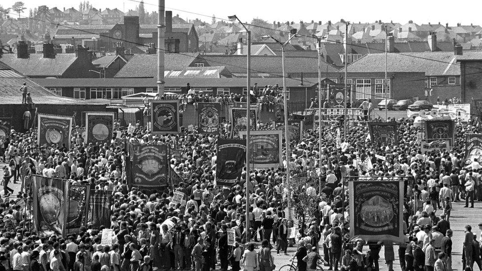 Striking miners march