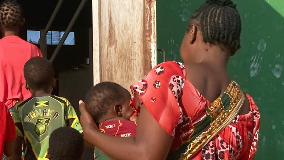 A woman in Pemba who was kidnapped by al-Shabab and her children - Pemba, Mozambique, September 2021