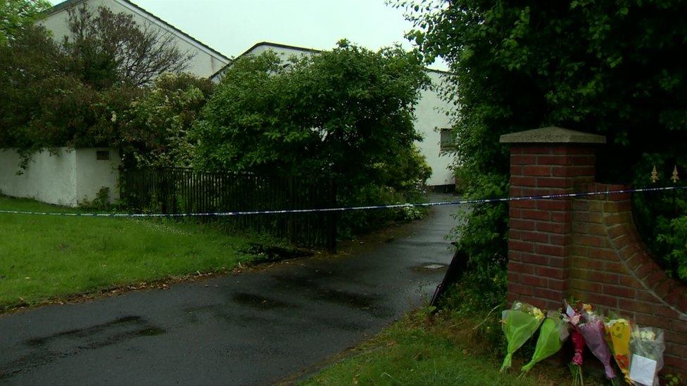 Floral tributes were left outside the house where the couple died in 2017