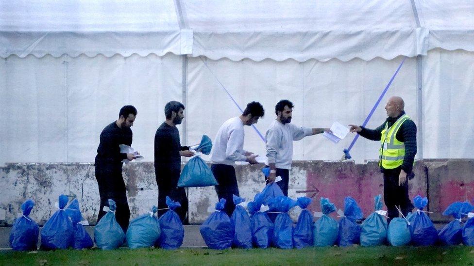 Migrants at Manston immigration centre in Kent last year