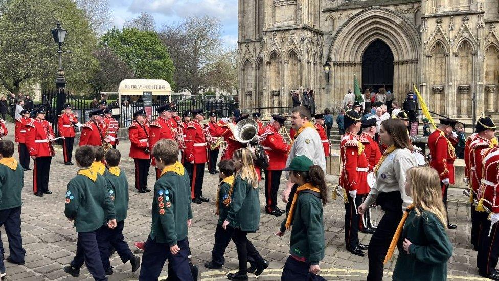 Scouts and The Yorkshire Volunteer Band outside York Minster