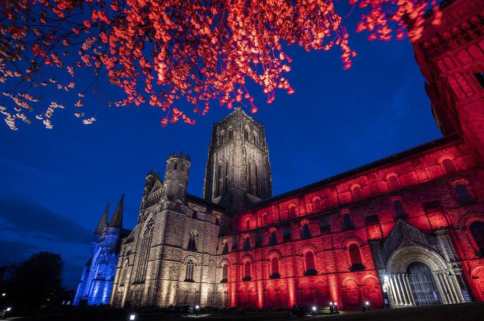 Durham Cathedral lit up red, white and blue