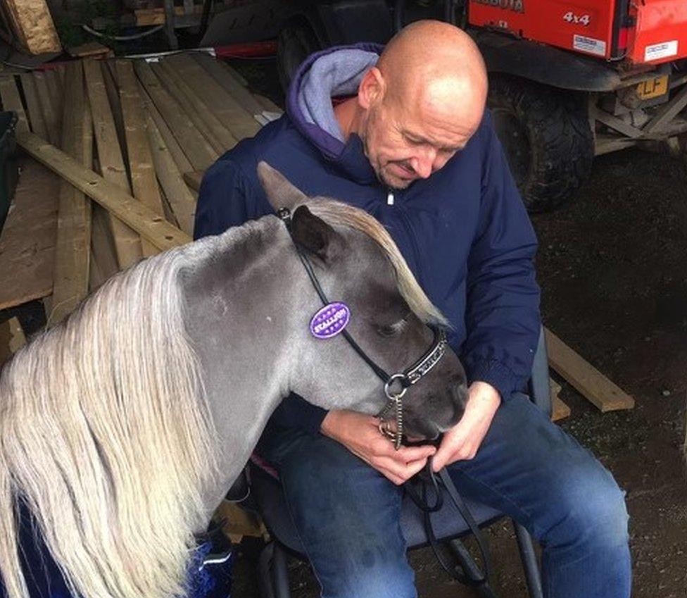 Kevin with a pony