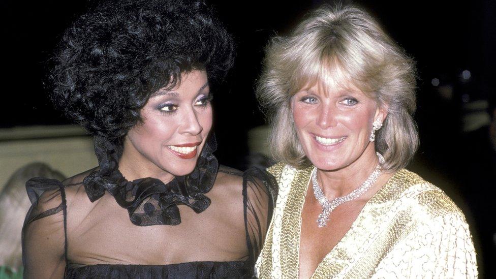 Pictured with her Dynasty co-star Linda Evans in 1984