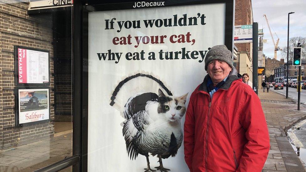 Jim with Peta poster