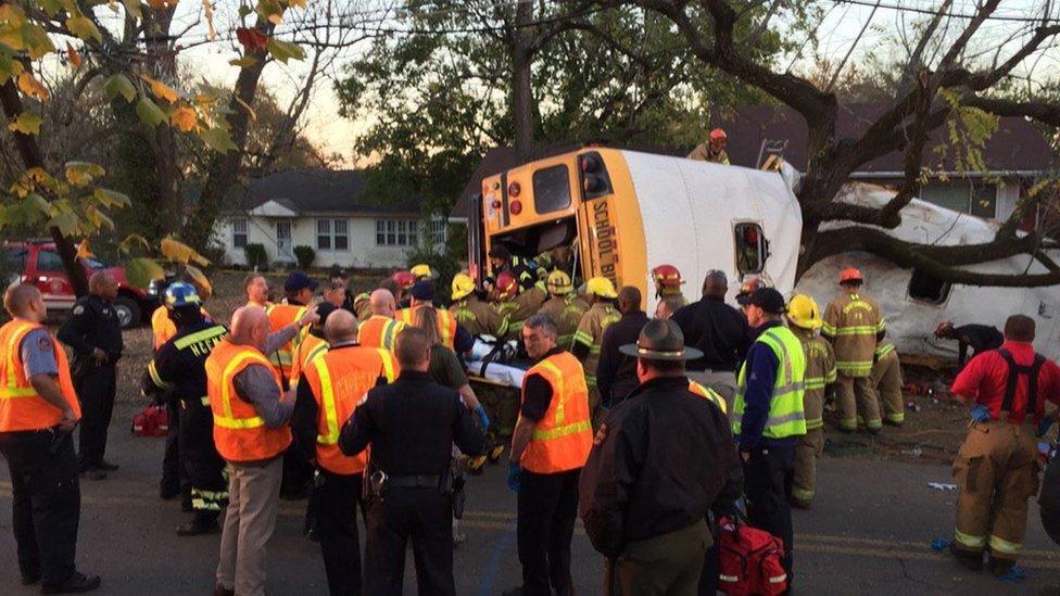 A handout photo provided by the Chattanooga Fire Department (CFD) shows emergency responders at the scene of a school bus crash in Chattanooga, Tennessee, USA, 21 November 2016.