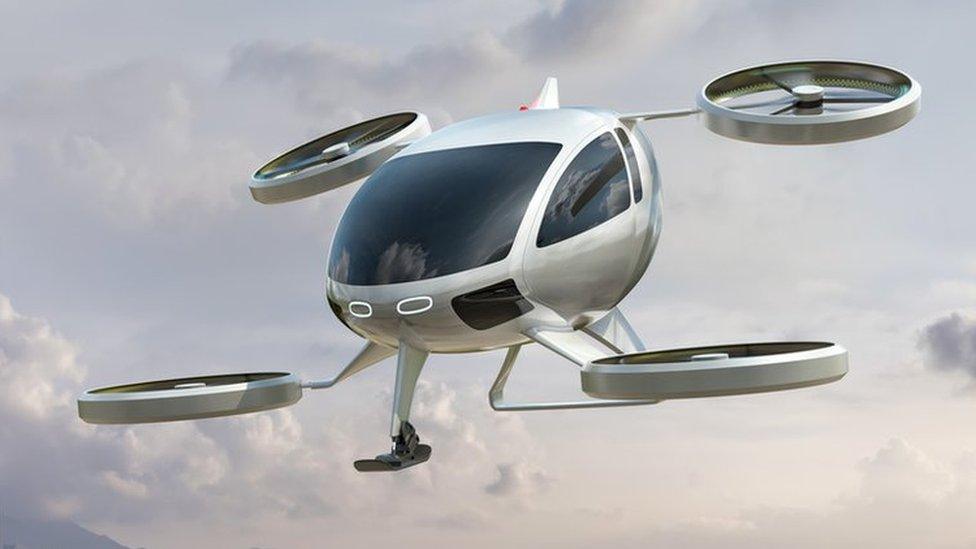 A computerised graphic of an air taxi - which looks a bit like a helicopter