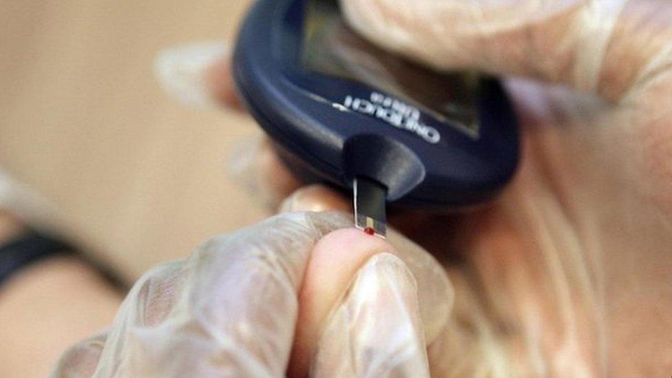 Patient undergoing a blood test for diabetes