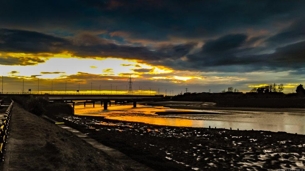 Richard Moult's shot of the sun setting behind Loughor bridge