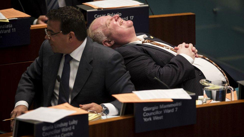 Rob Ford laughs during council meeting at City Hall in Toronto. 14 November 2013