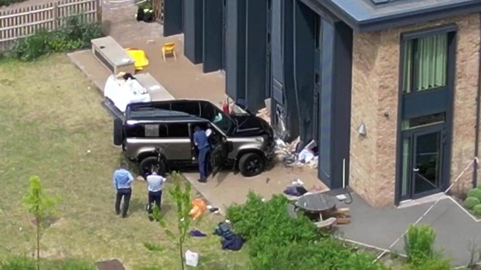 The Land Rover Defender is seen inside the grounds of The Study Preparatory School