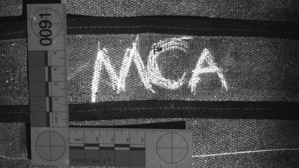 bag strap with letters MCA