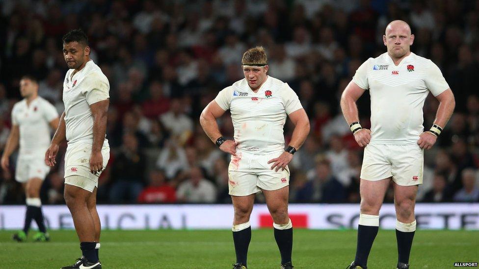 England players looking disappointed after loss