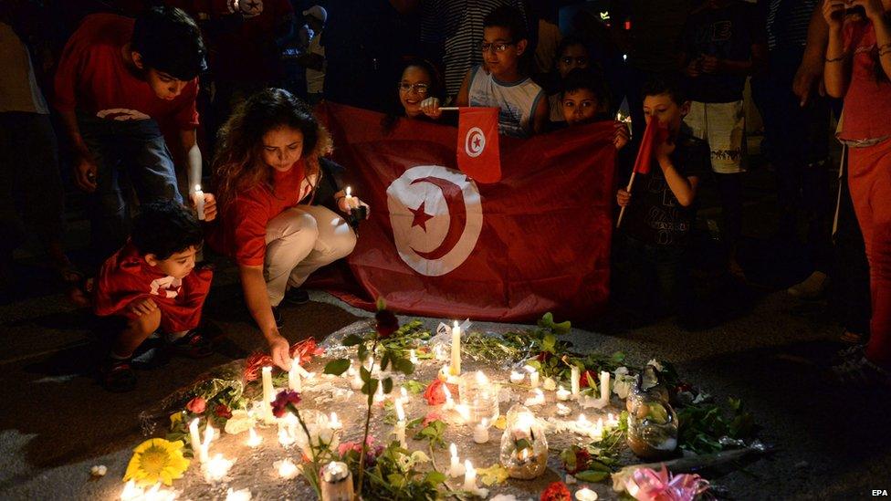 Tunisians stage a vigil in front of the Imperial Marhaba hotel in Sousse