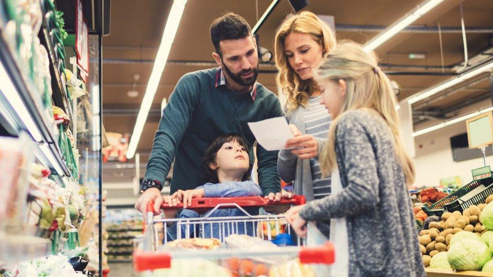 Family shopping in a supermarket