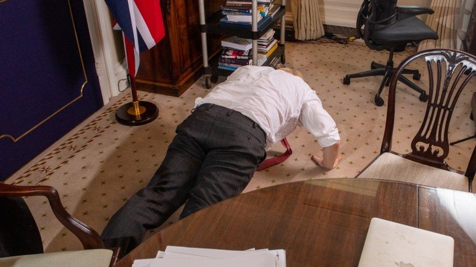 Boris Johnson does a press-up