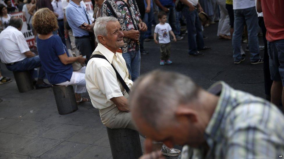 Members of the Communist-affiliated PAME labor union gather during an anti-austerity rally at Omonia square in Athens, on 10 June