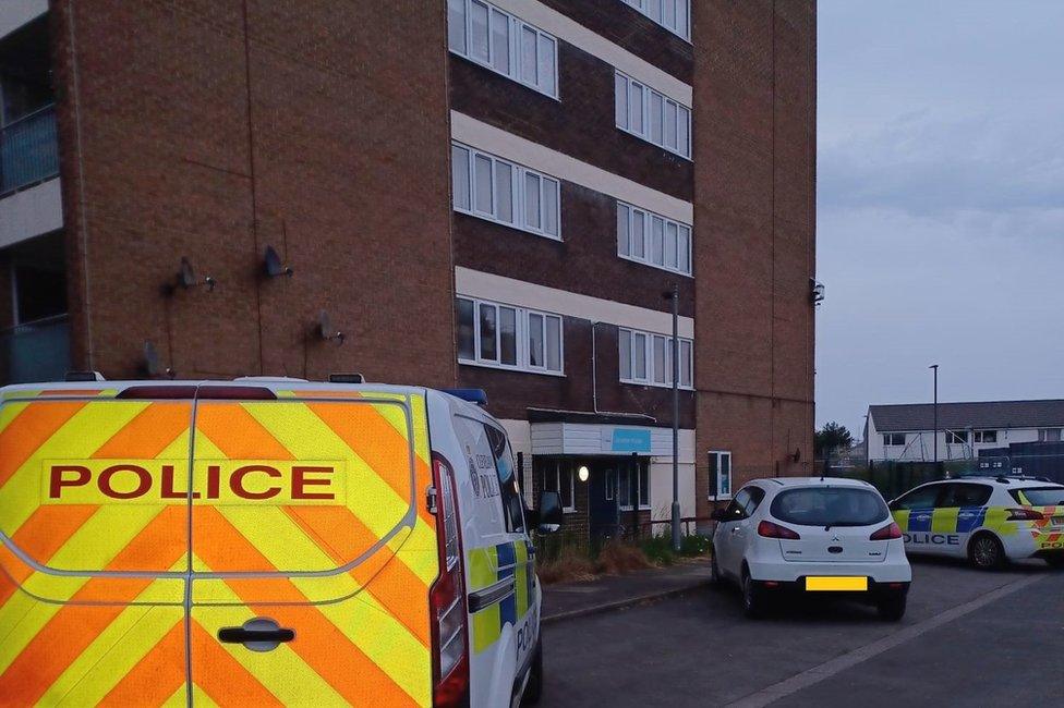 Police outside flats in Grangetown