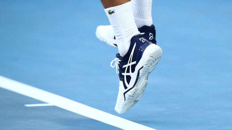 Novak Djokovic's feet, above the court at the Australian Open in 2018