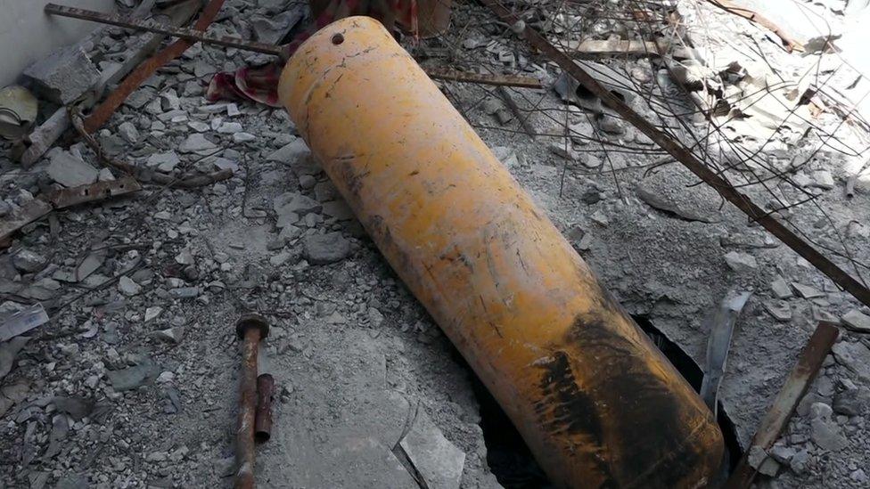 A yellow compressed gas canister found on the roof of what witnesses said was the building targeted in an alleged chemical weapons attack in Douma, Syria, on 7 April 2018