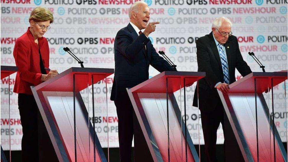 Democratic presidential hopefuls Massachusetts Senator Elizabeth Warren (L), former Vice President Joe Biden (C) and Vermont Senator Bernie Sanders (R) participate in the sixth Democratic primary debate