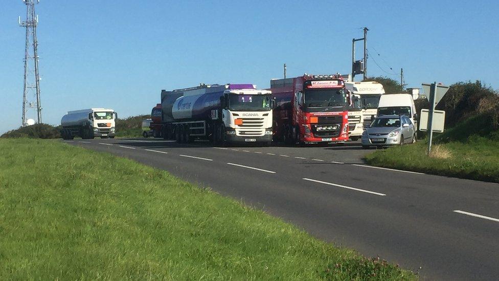 Lorries have pulled up at a nearby lay-by