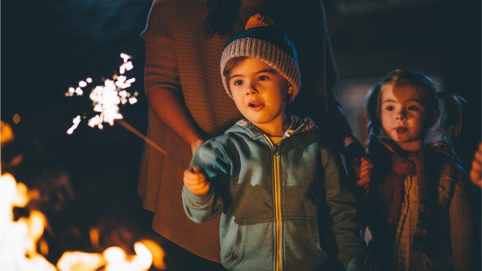 Child with sparkler