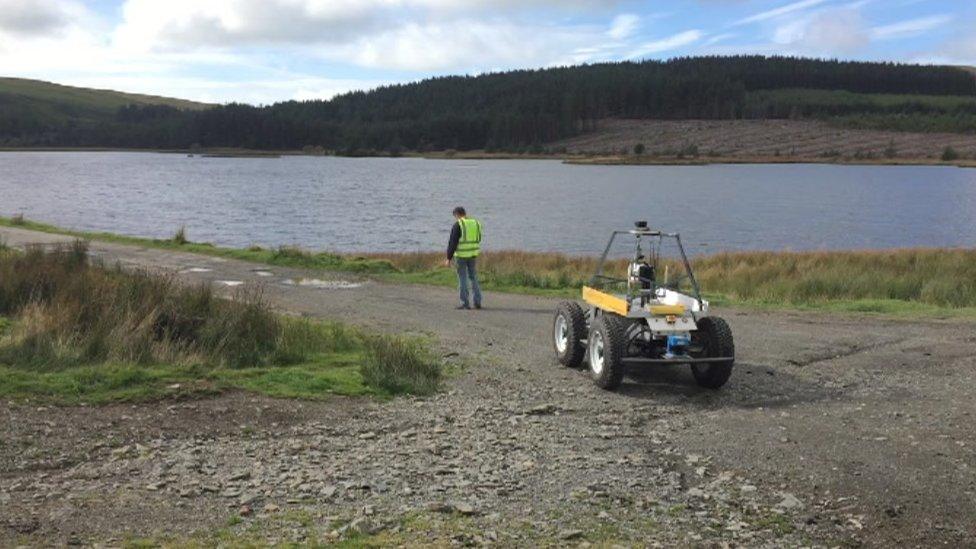 Aberystwyth robot Idris and Dr Mark Neal