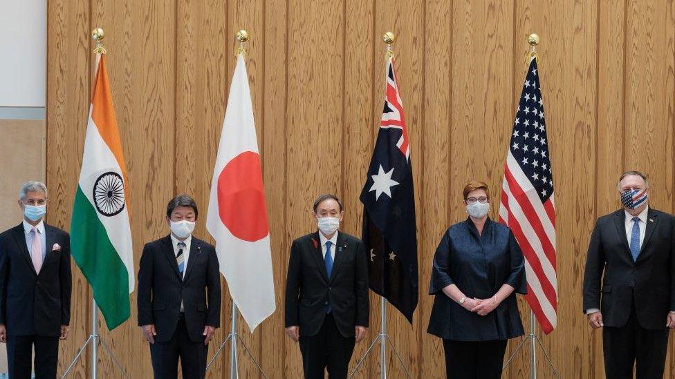 (L-R) India's Foreign Minister Subrahmanyam Jaishankar, Japan's Foreign Minister Toshimitsu Motegi, Japan's Prime Minister Yoshihide Suga, Australia's Foreign Minister Marise Payne and US Secretary of State Mike Pompeo