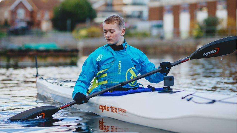 Monger trains in a kayak