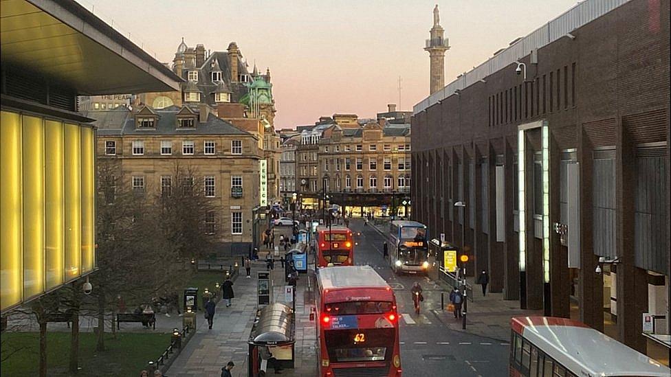 View down Blackett Street showing buses