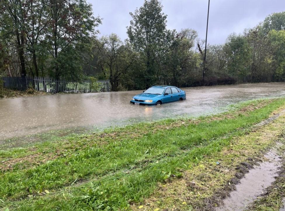 A car stuck in floodwater on Jordanthorpe Parkway, Sheffield