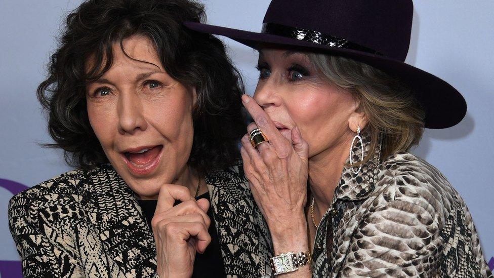 Actresses Lily Tomlin (L) and Jane Fonda (R) arrive for the Season 4 premiere of Netflix's 'Grace and Frankie' at the Arclight Theater in Culver City, California on January 18, 2018