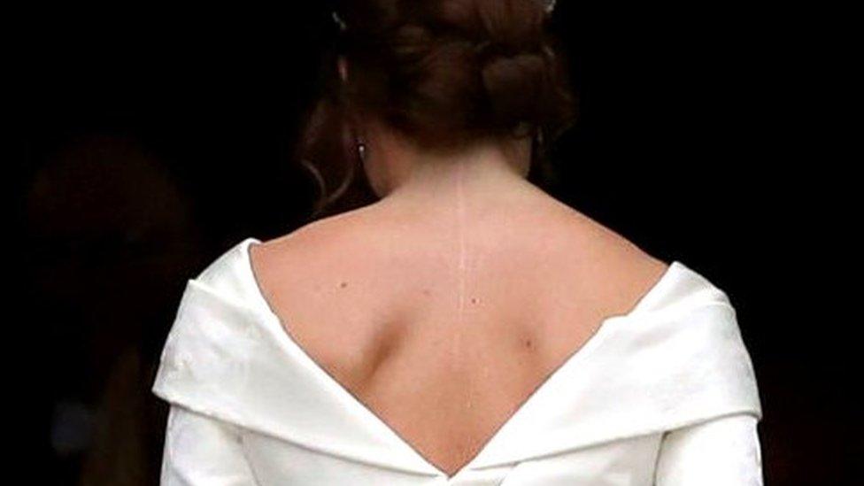 Princess Eugenie shown in her wedding dress from the back