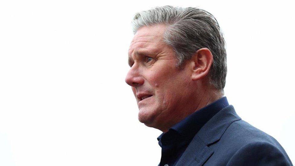 Labour leader Sir Keir Starmer is seen against the background of a white sky