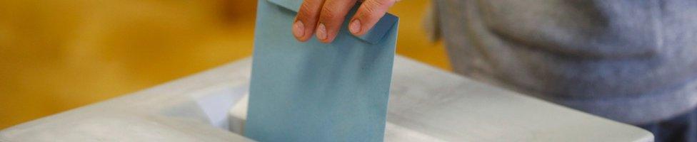 man casts vote in Vienna