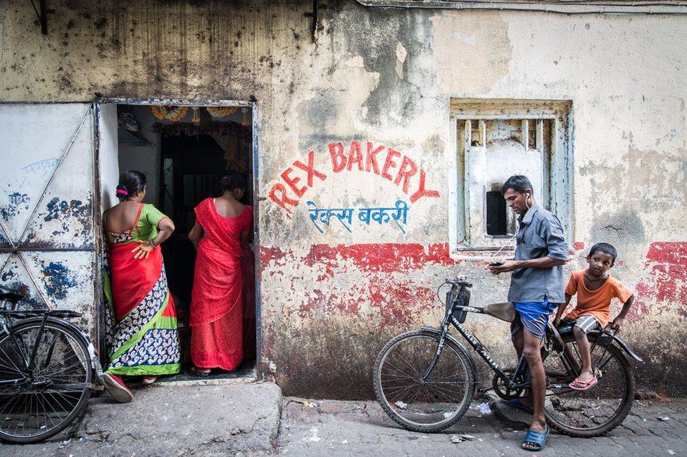 Women queuing up to place their bread orders the day before Diwali in Mumbai