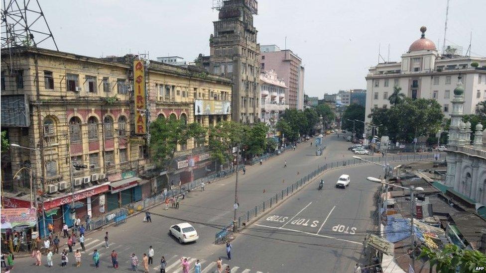 Indian trade union activists block a junction during a protest in Kolkata on September 2, 2015