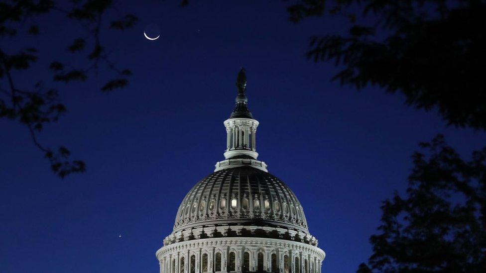 Moon over the US Capitol