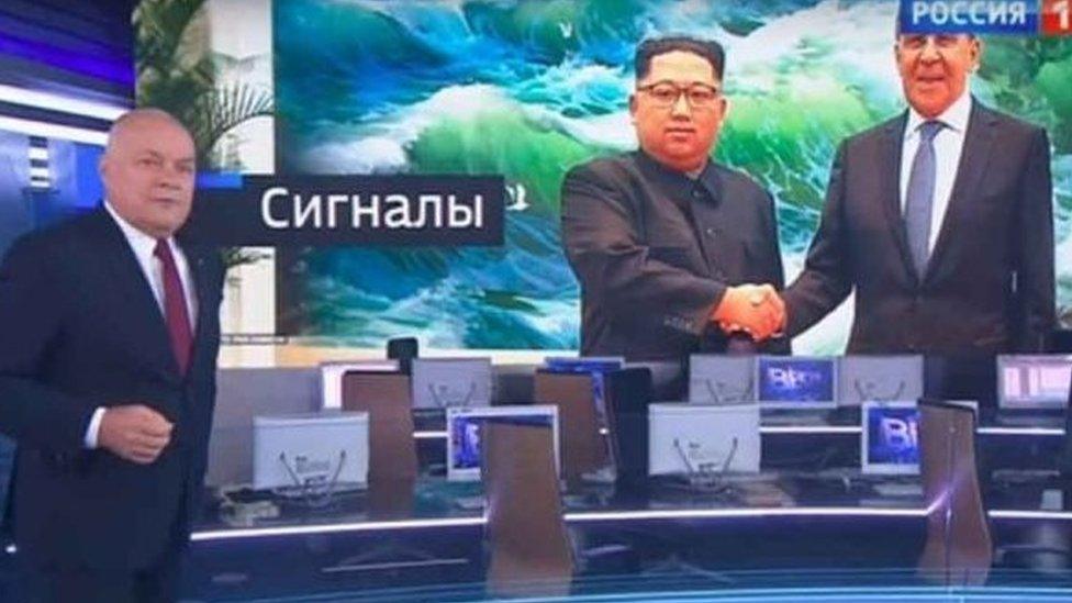 Screen shot of Kim Jong-un shaking hands with Sergey Lavrov