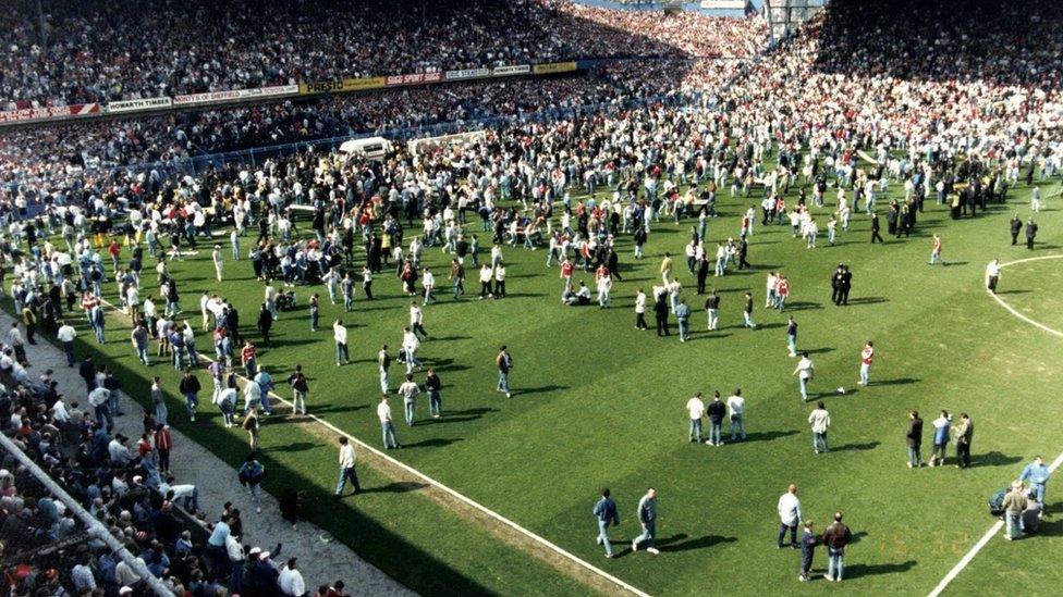 Fans on the pitch at Hillsborough