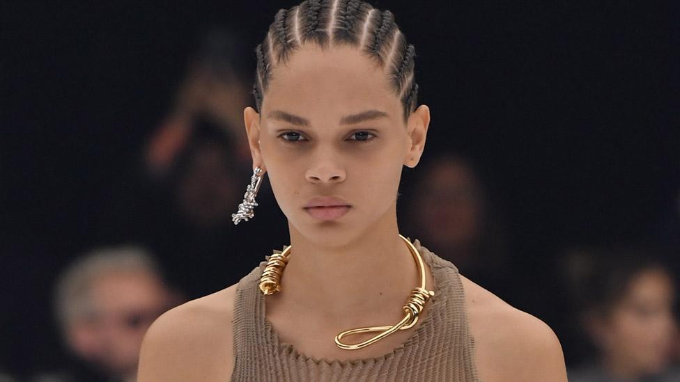 Givenchy model with "noose" necklace at Paris Fashion Week