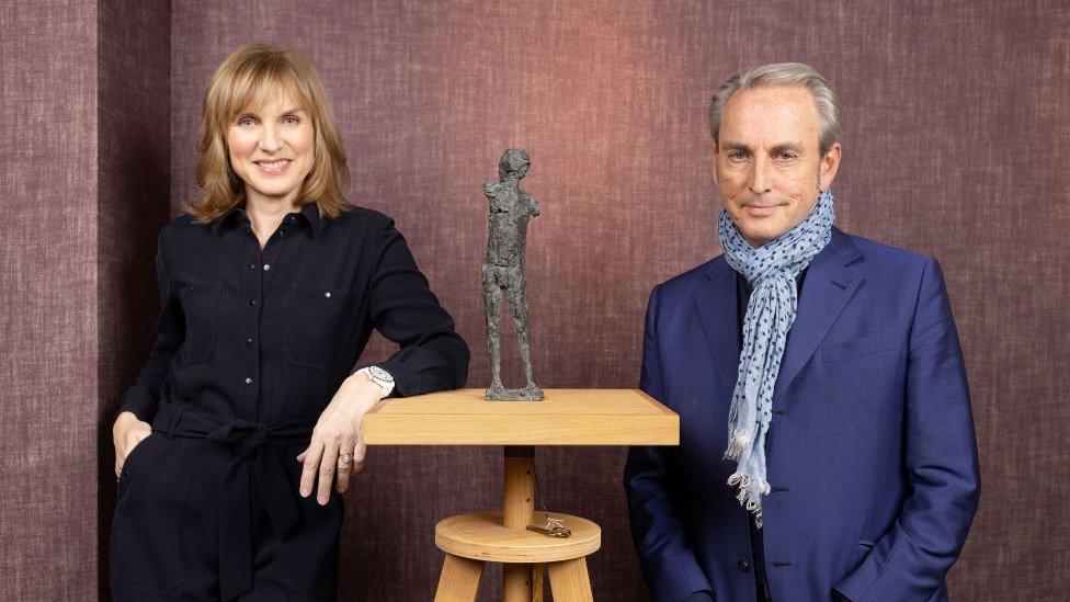 Fiona Bruce and Philip Mould with the bronze sculpture