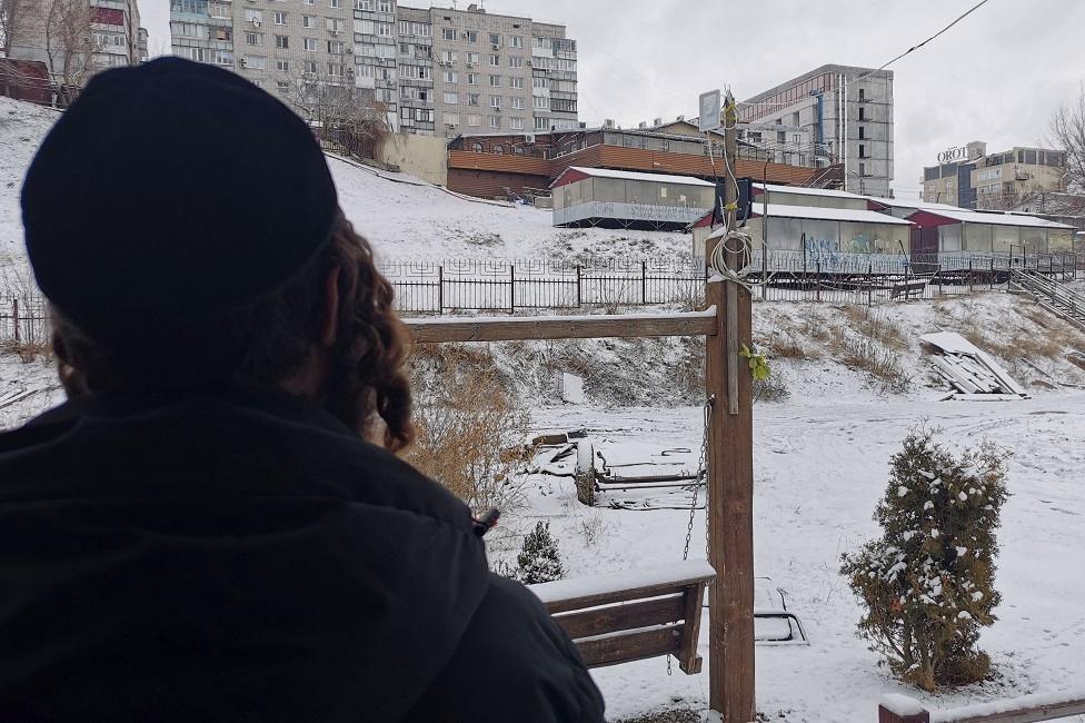 A Jewish Kabbalist looks on the buildings near to the synagogue of Uman