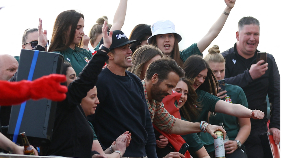 Rob, Ryan and others on parade bus