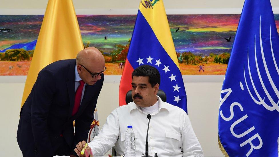 Venezuela's President Nicolas Maduro (right) at a meeting between Venezuela's government and opposition leaders for Vatican-backed talks, 30 October 2016