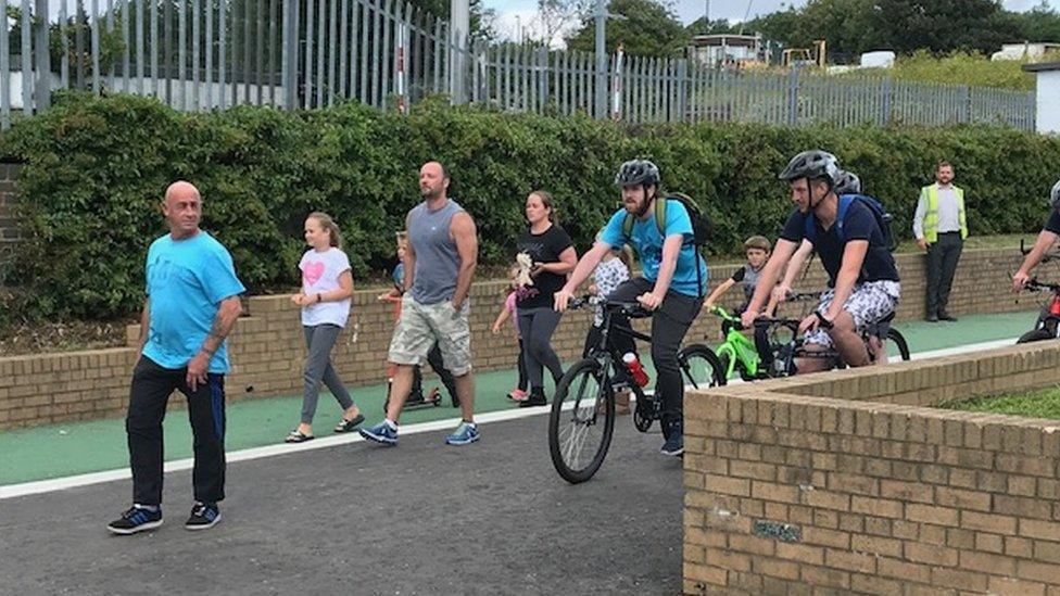 People using the reopened Tyne pedestrian and cycle tunnels