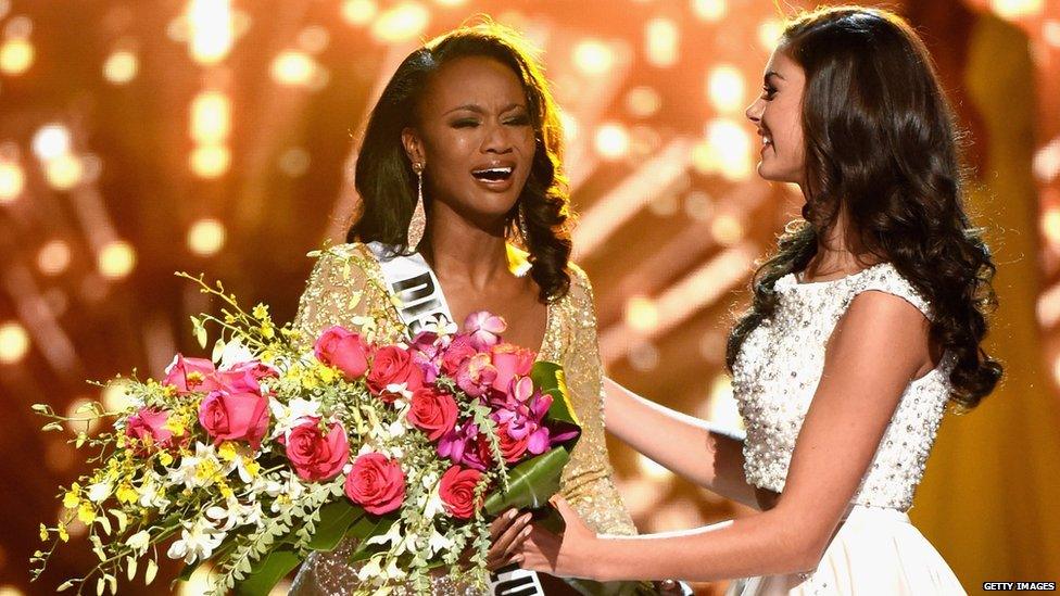 Miss District of Columbia USA 2016 Deshauna Barber is congratulated by Miss Teen USA 2016 Katherine Haik as she is named Miss USA 2016