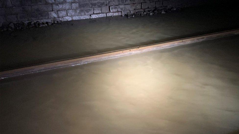 Flooded tracks inside Crick Tunnel