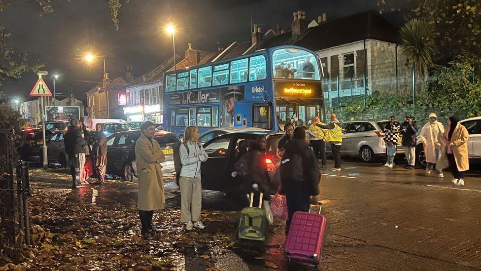 A queue of residents waiting to get bus